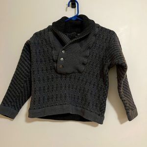 Warm coogi sweater. Says large but it really fits a small. Brand new